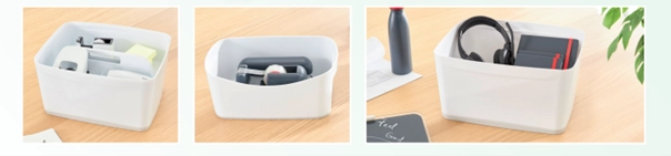 Das Bild zeigt drei modulare Leitz My Box Aufbewahrungsboxen in verschiedenen Größen, die jeweils verschiedene Bürogegenstände wie Notizblöcke, Tacker und Kopfhörer enthalten. 