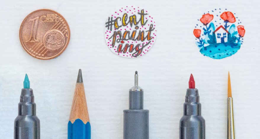 1-Cent-Münze neben Mini-Zeichnungen und unterschiedlichen Stiften