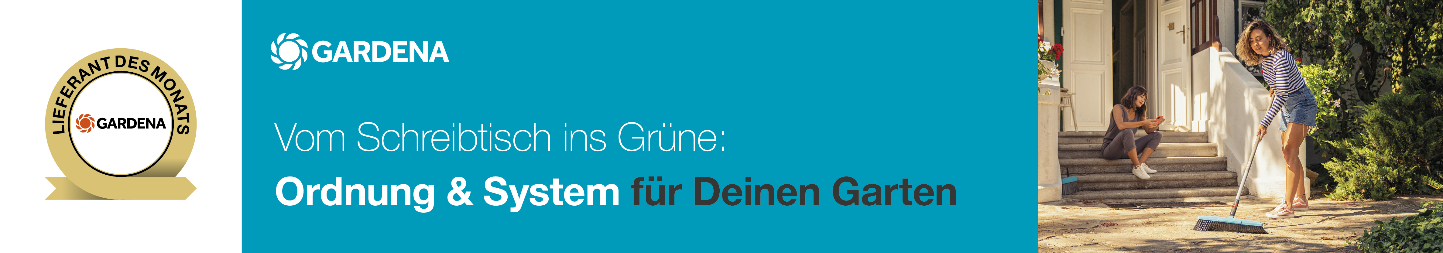 Frau fegt Weg vorm Haus