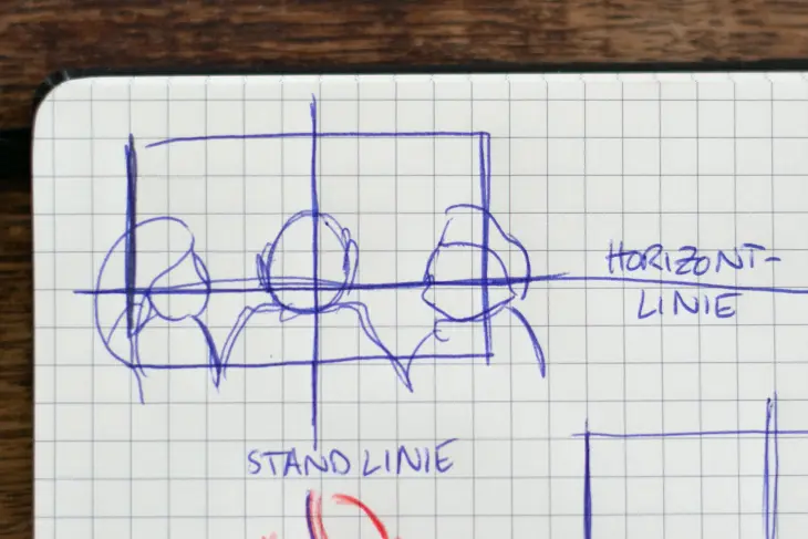 Nahaufnahme einer Skizze zum perspektivischen Zeichnen mit Horizontlinie und Standortlinie.