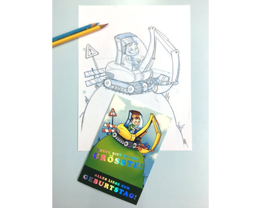 Geburtstagskarte mit Bagger als Skizze, zwei Buntstifte liegen daneben.
