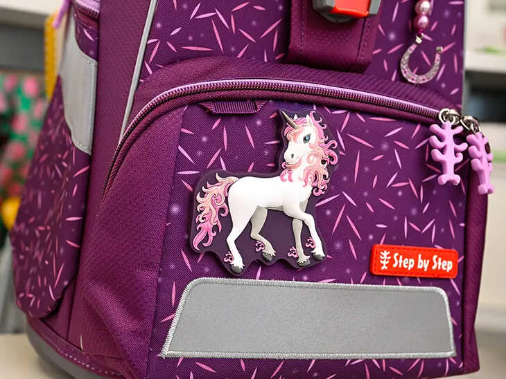 Lila Schulranzen mit Konfettimuster von Step by Step mit Einhorn Magic Mag.