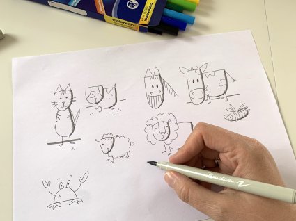 Sketchnote Tierfiguren werden mit einem Brushpen ausgemalt.