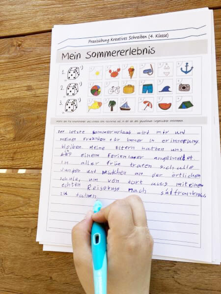 Eine Kinderhand schreibt auf einem Blatt Papier eine kreative Schreibübung für Grundschüler der 4. Klasse mit dem Schreiblernfüller Easybirdy von Stabilo.