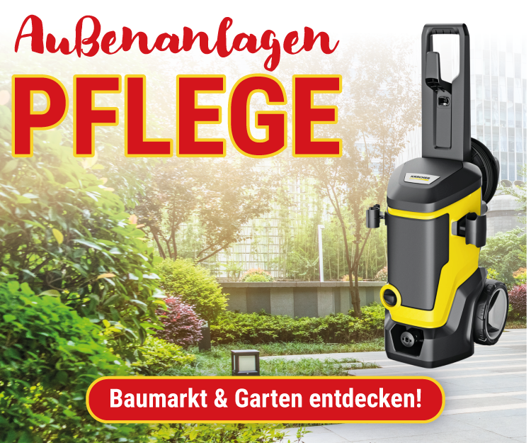 Ein Hochdruckreiniger steht auf einer Außenanlage.