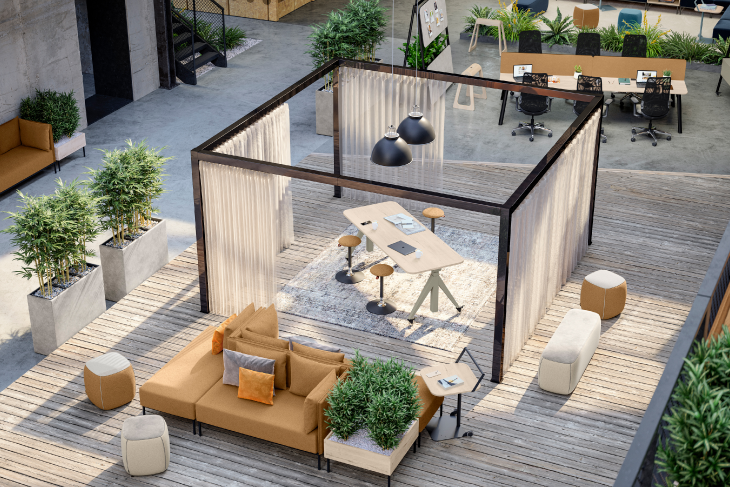 Eine moderne Büroeinrichtung mit Zonierung und Loungebereich.