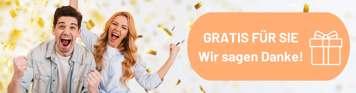 Eine Frau und ein Mann freuen sich vor Konfetti.