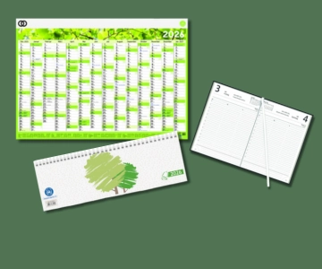 Verschiedene Kalender auf dunkel grünem Hintergrund