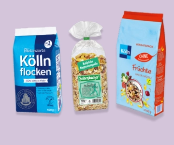 Müslisorten vor lila Hintergrund.