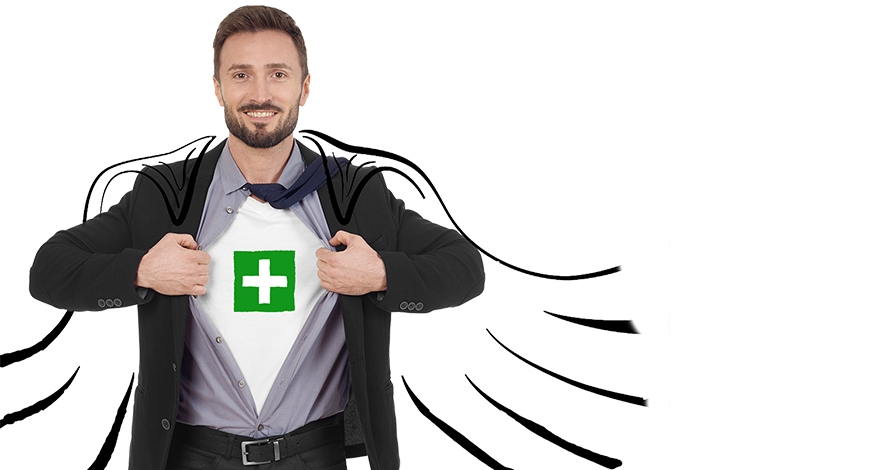 Mann im Anzug zeigt Shirt mit grünem Erste-Hilfe-Kreuz