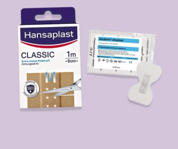 Pflaster vor lila Hintergrund.