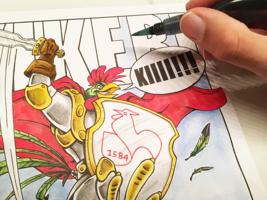 Nahaufnahme einer Hand, die ein Bild im Comicstil koloriert.