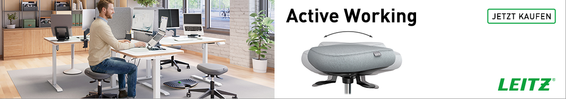 Mann an Schreibtisch auf Active Hocker
