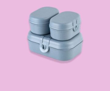 Lunchbox vor pinkem Hintergrund.