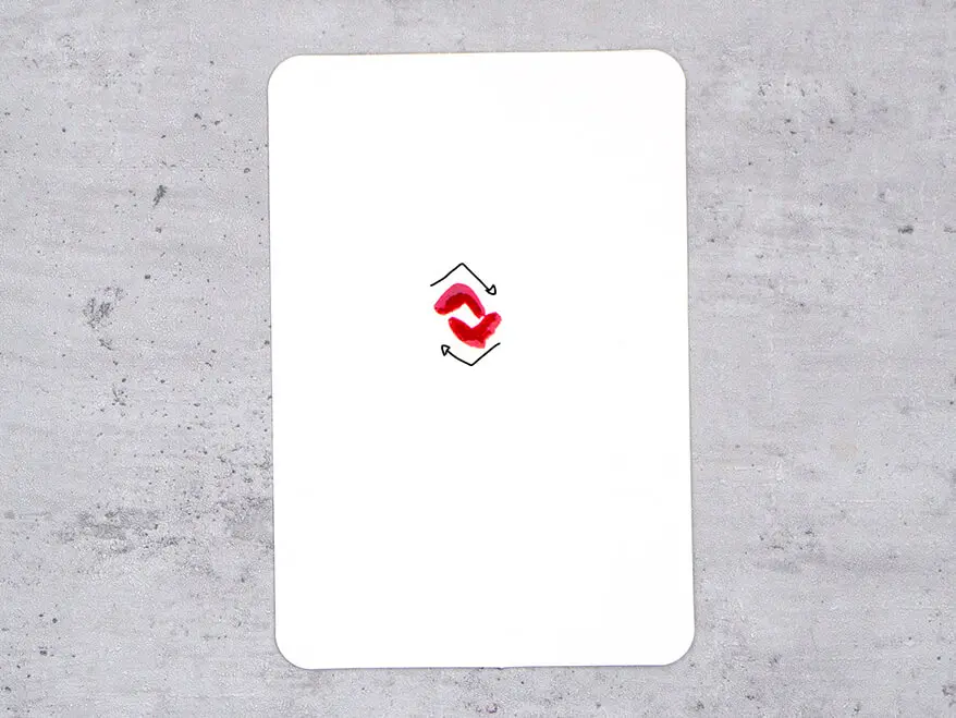 Auf eine Aquarellpostkarte von Hahnemühle wird Schritt für Schritt eine rote Rose aquarelliert. Hier ist Schritt eins zu sehen: innerste Blütenblätter.