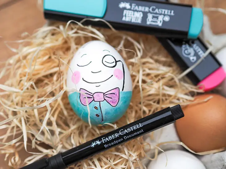 Mit Stiften von Faber-Castell bemaltes Ei mit Gesicht. Foto: Johanna Rundel