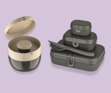 Dosen vor lila Hintergrund.