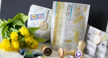 Das Geschenkpapier ist alle? Verpacken Sie Ihr Präsent in kreativ gestaltetes Zeitungspapier! Mehr dazu bei Trugge in Geseke und im Onlineshop.