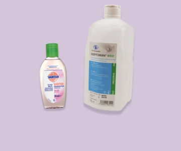 Desinfektion vor lila Hintergrund.