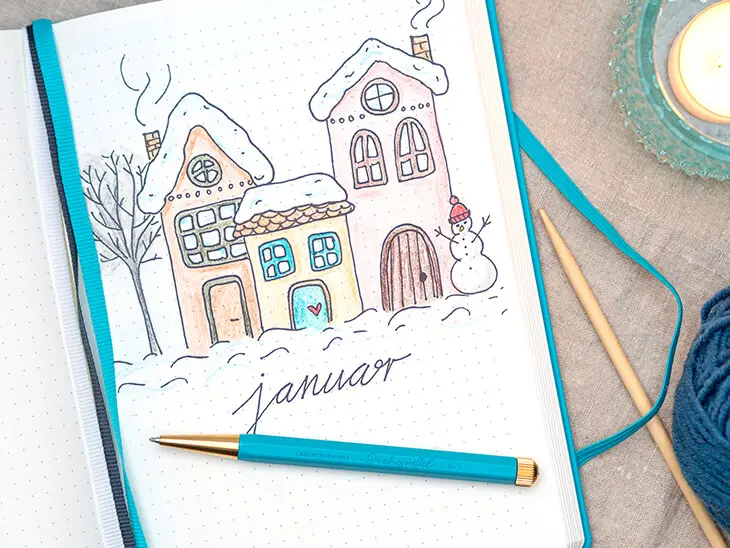 LEUCHTTURM1917 Bullet Journal mit Januar Deckblatt: „Häuserzeile im Winter“. Foto: Johanna Rundel