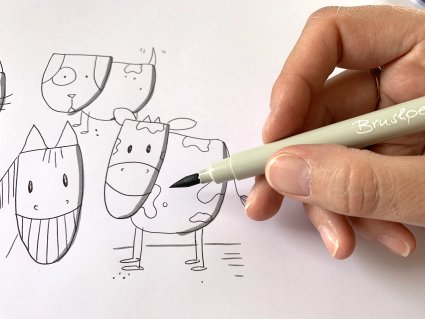 Illustrierte Tierfiguren einer Kuh, eines Pferdes und eines Hundes werden mit einem Brushpen ausgemalt.