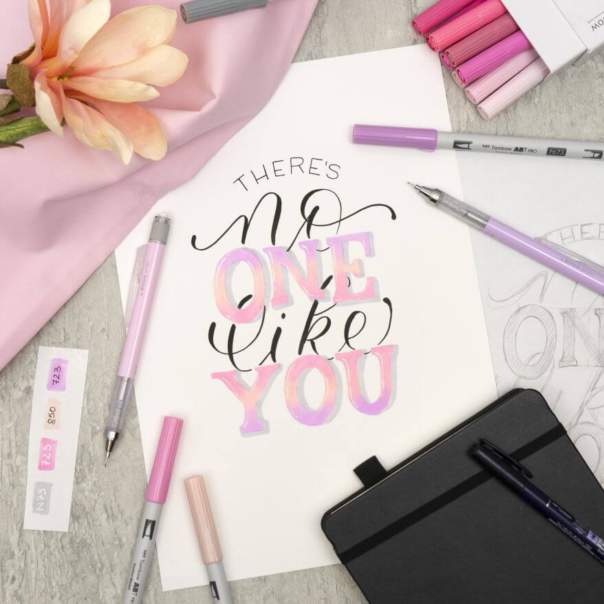 Handlettering von Kathrin-Nina Vinko mit den Alkoholmarkern ABT PRO von Tombow: "There's no one like you" in zarten Rosatönen.