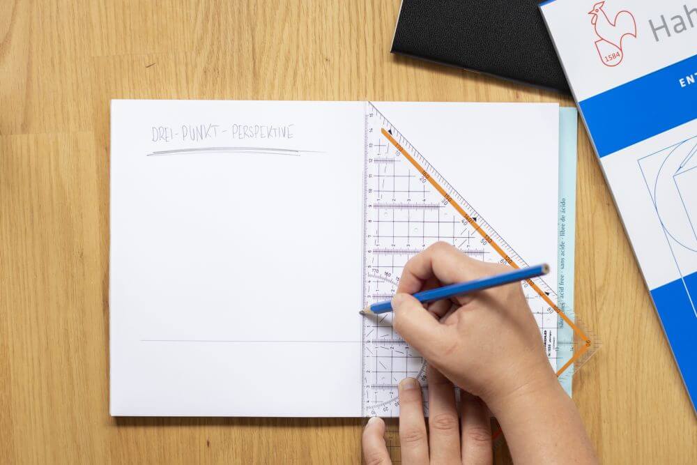 3-Punkt-Perspektive Schritt 2: Eine Hilfslinie einzeichnen, die im rechten Winkel zur Horizontlinie steht.