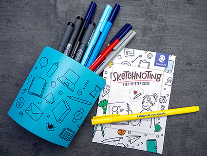 Ein Sketch Noting-Set von Staedtler mit einigen Stiften und Anleitung.