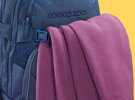 Detailaufnahme des Befestigungsgurtes beim Schulrcuksacks coocazoo PORTER.
