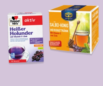 Heißgetränke vor lila Hintergrund