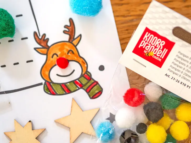 Gezeichneter Rentierkopf mit Nase aus Pompon von KNORR prandell. Foto: Johanna Rundel