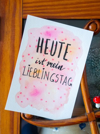 In Rosa gestaltete Aquarellkarte mit Spruch "Heute ist mein Lieblingstag"